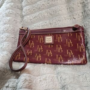 Dooney & Bourke Burgandy Clutch Wristlet with Signature Monogram